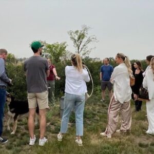 Family Tour Group outside listening